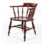 A 19th century elm smokers/captain's chair.