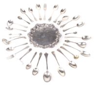 An assortment of silver teaspoons & silver plated tableware.