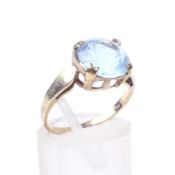 A vintage pale-blue paste single stone ring.