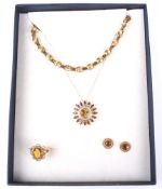 A set of four vintage gold jewels.