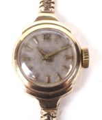 A mid century ladies 9ct gold cocktail wristwatch.