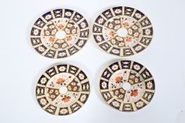 Four Royal Crown Derby imari pattern plates. 1970s-80s, printed iron-red marks and pattern no.