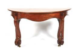 A Victorian mahogany console table.