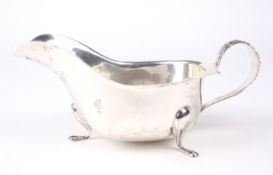 A mid-century silver sauce boat.