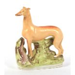 19th century Staffordshire pottery model of a greyhound.