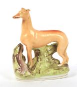 19th century Staffordshire pottery model of a greyhound.