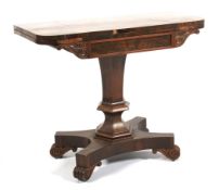 A William IV rosewood D-shaped folding tea table.