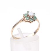 A 9ct gold, opal and emerald cluster dress ring.