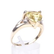 A QVC 9ct gold, yellow beryl and diamond dress ring.