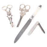 Two pairs of silver grape scissors,