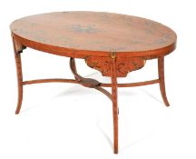 A Sheraton Revival satinwood oval coffee-table.