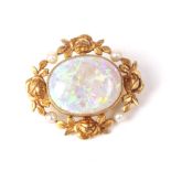 An early 20th century Continental gold, opal and seed-pearl brooch.