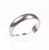 A vintage 18ct white gold shallow 'D' section wedding band.
