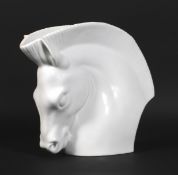 A Royal Worcester Art Deco style white porcelain vase modelled as a horse's head.