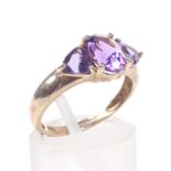 A 9ct gold and amethyst three stone.
