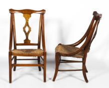 A pair of Arts and Crafts rush seated chairs.