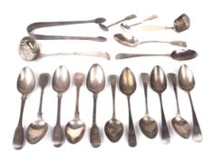 Assorted silver flatware.