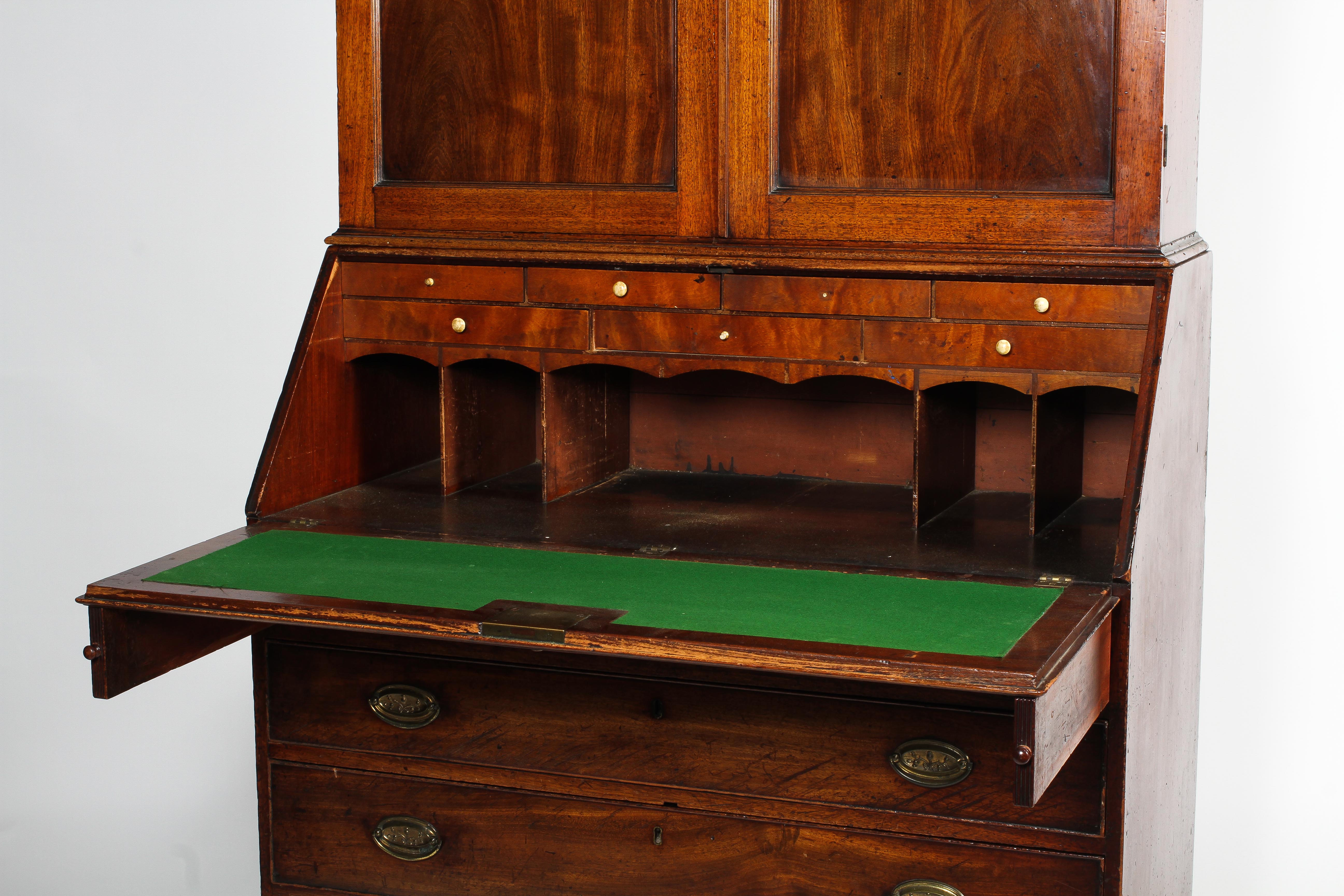 A Victorian mahogany bookcase on a Georgian bureau base. - Image 2 of 3