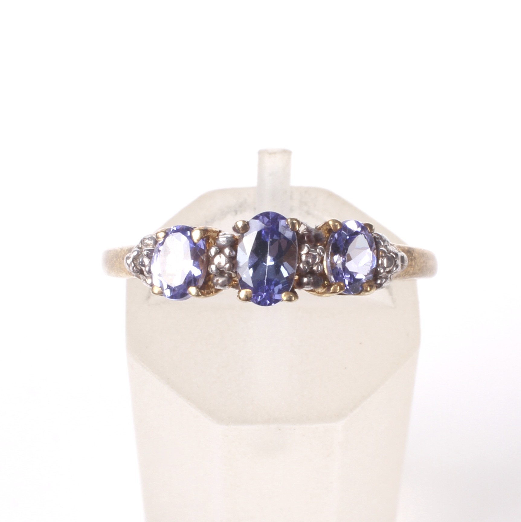 A tanzanite three stone dress ring. - Image 2 of 4