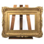 A Victorian giltwood picture frame.