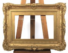 A Victorian giltwood picture frame.