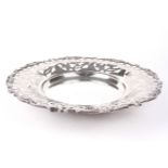 An Egyptian silver pierced circular stand.