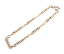 A Vintage yellow metal fancy rope-twist fetter link bracelet on a trigger clasp stamped '375'.