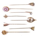 Eight Victorian and later stick pins.