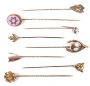 Eight Victorian and later stick pins.