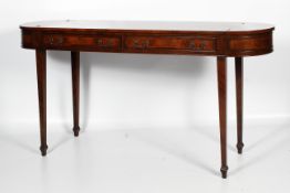 An Edwardian mahogany D-end serving table.