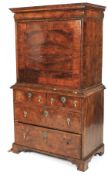 An early 18th century burr walnut secretaire on chest.