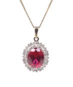 A modern 9ct gold, synthetic-ruby and diamond oval cluster pendant and a chain.