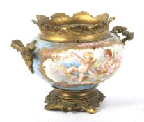 A gilt-metal mounted Sevres-style turquoise ground compressed globular jardiniere.