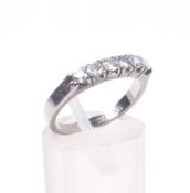 A diamond six stone ring.