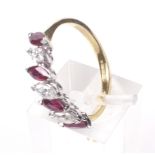 A vintage 18ct gold, ruby and diamond seven stone ring.