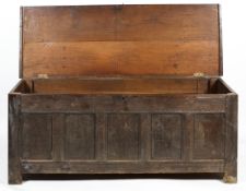 An 18th century oak paneled coffer of large proportion.