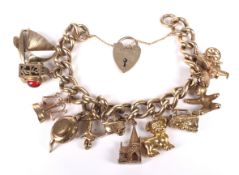 A vintage 9ct gold curb link 'Charm' bracelet on a padlock clasp.