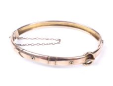A Victorian 9ct rose gold 'buckle' bangle.