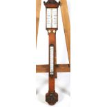 A mid 19th century oak stick barometer. By Boxwell Brighton