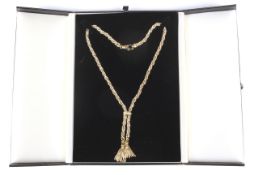 A vintage Italian bi-colour gold rope-twist tassel necklace.