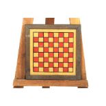 Edwardian hand painted glass chess board set in a rectangular oak frame