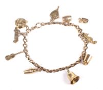 An early 20th century rose gold filed round belcher link 'charm' bracelet.