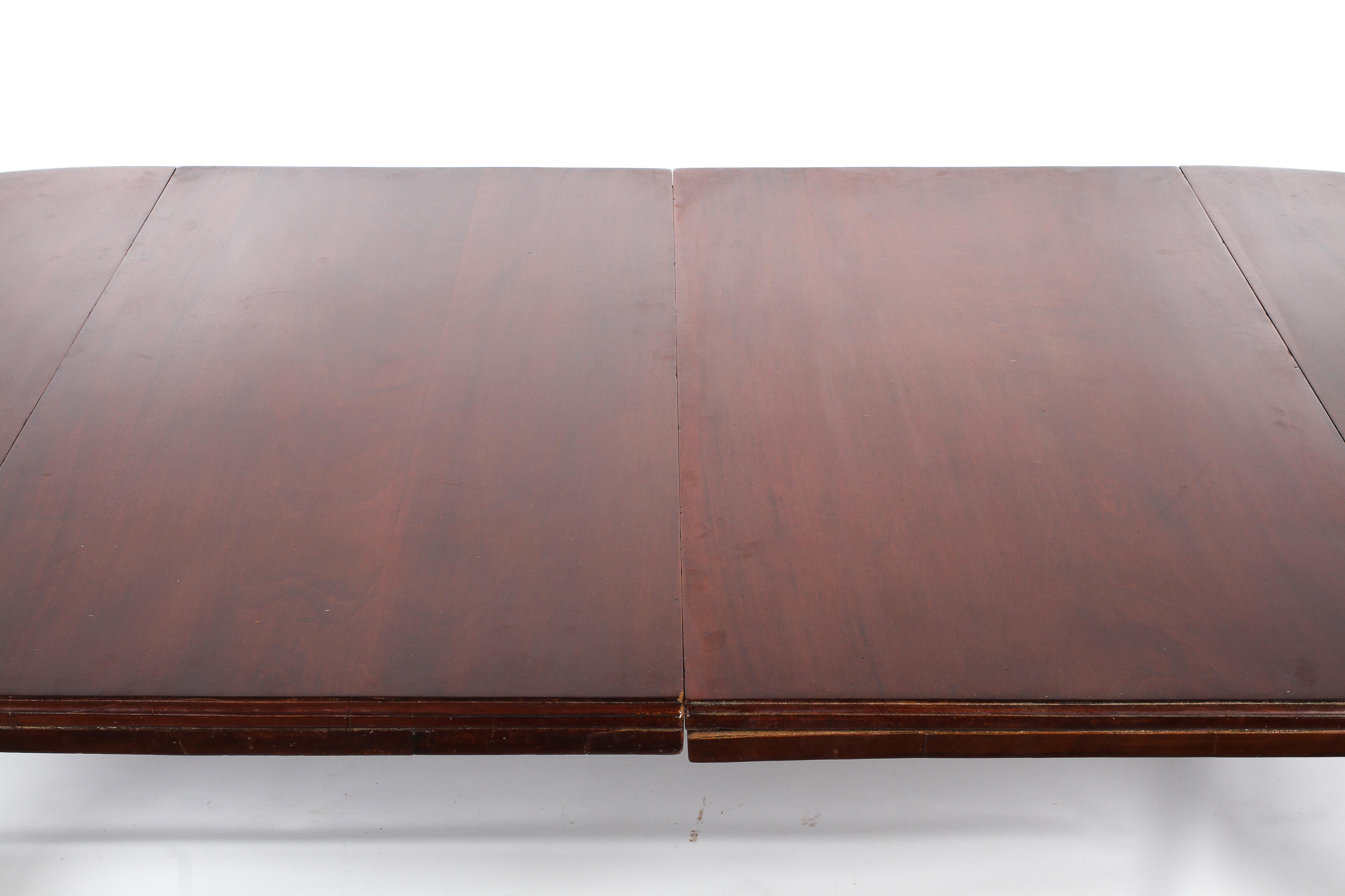 A Regency oval mahogany extending dining table. - Image 2 of 5