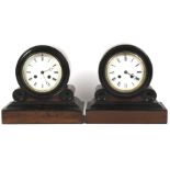 A pair of similar mahogany and ebony Art Deco mantle clocks.