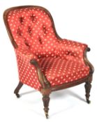 A Victorian mahogany buttonback armchair.