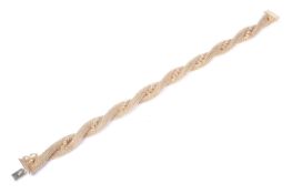 A modern Italian(?) yellow metal braided fancy rope and bead bracelet.