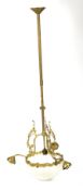 A Large brass hanging chandelier.