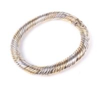 A vintage Italian 9ct bi-colour gold wire-twist bangle.