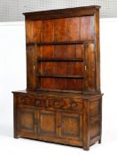 An 18th century elm dresser.