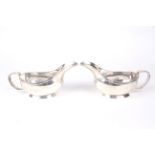 A pair of Art Deco silver sauce boats.